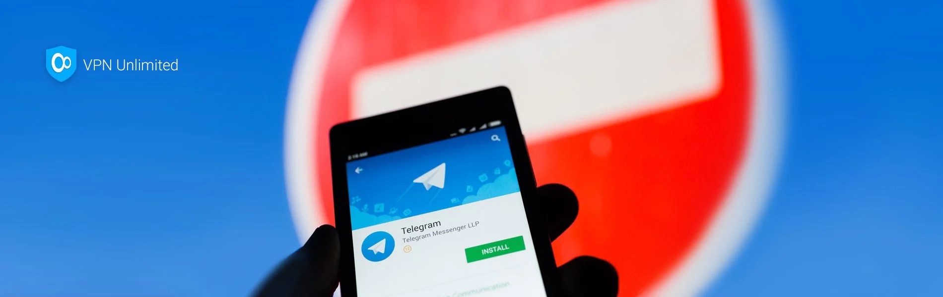 Man holding a smartphone with Telegram app on the screen - looking into ways to bypass the blocks
